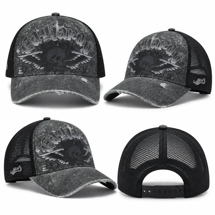 Gorra trucker unisex Ed Hardy Flaming Gothic Skull con efecto desgastado gris y malla negra, disponible en Mundogorras Gran Canaria.